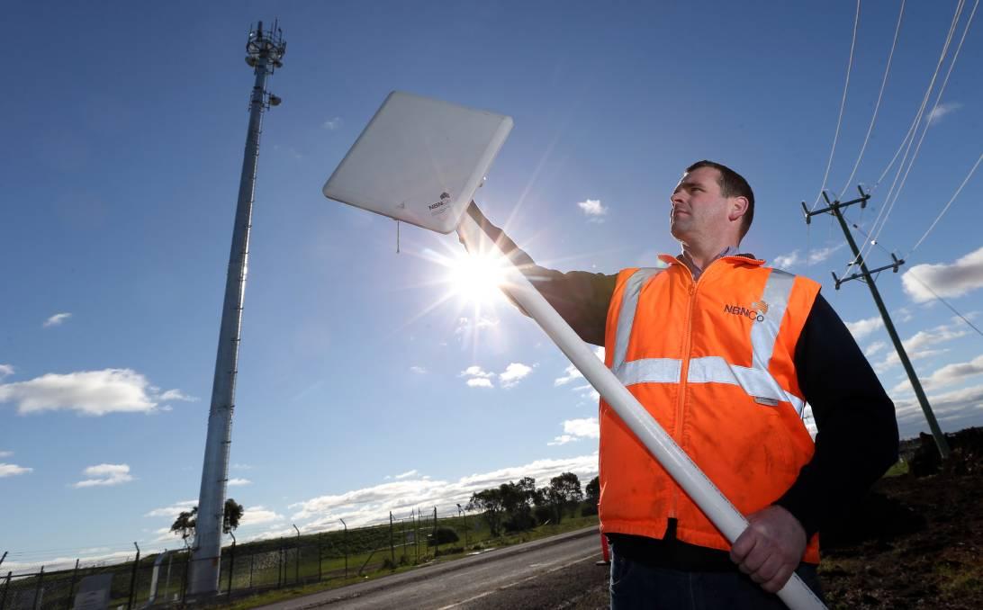 NBN technician setting up a fixed wireless connection